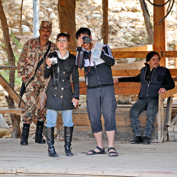 Jordan boardguarde & tourists. Jordan river